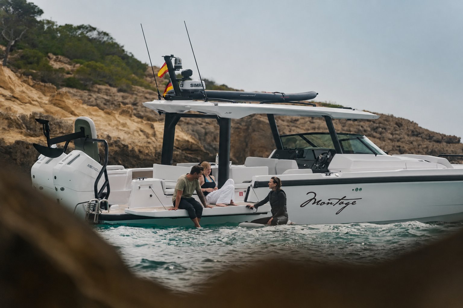 The house yacht at anchor, branded as Montage